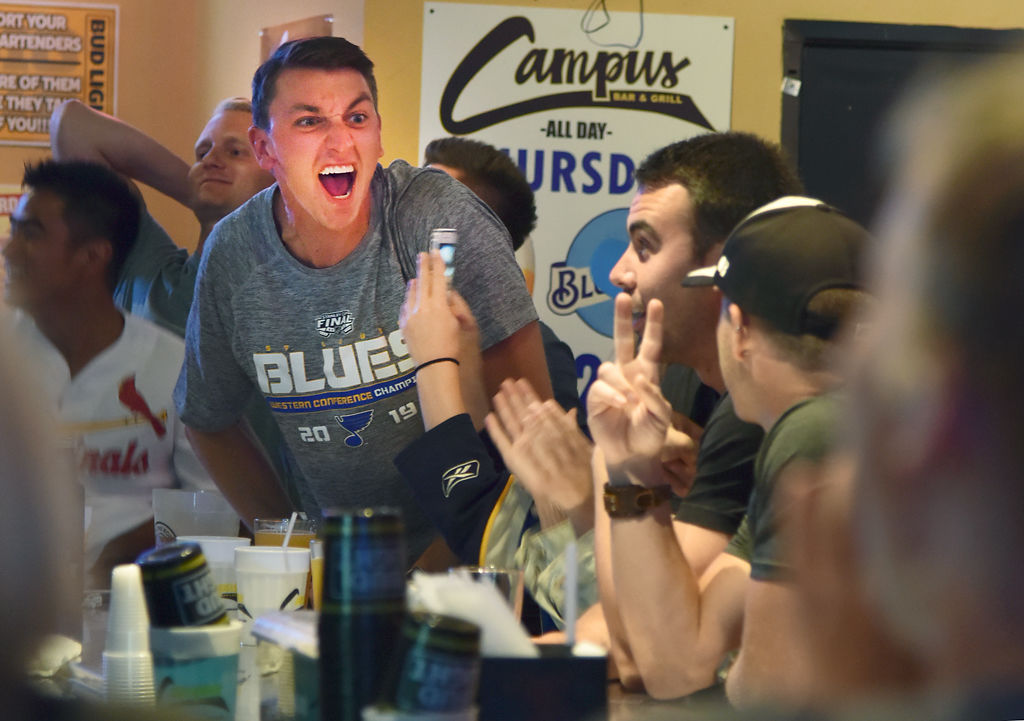 Tim Schaeffler shouts cheers after the Blues scored their second goal in the end of the first period